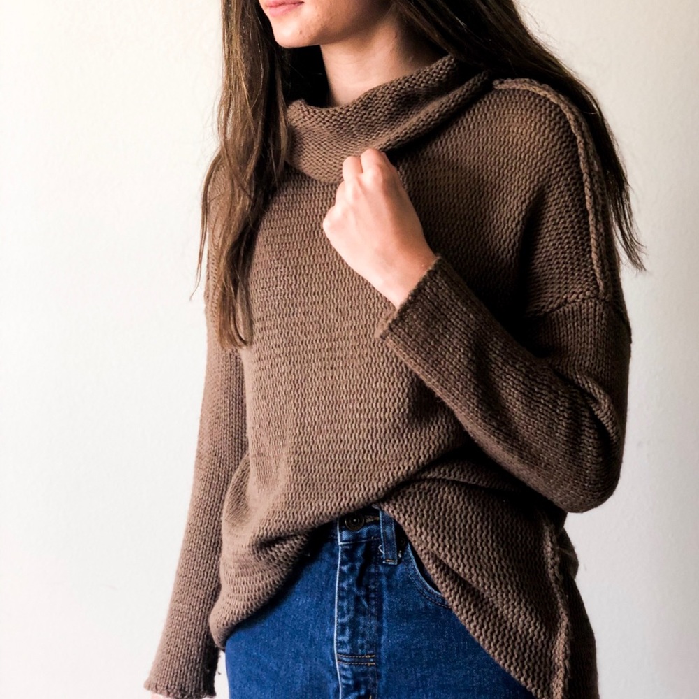 Over-sized knit tunic length turtleneck sweater